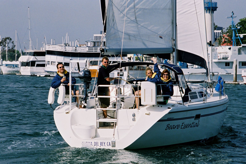 Family sailing on the Beare Essential