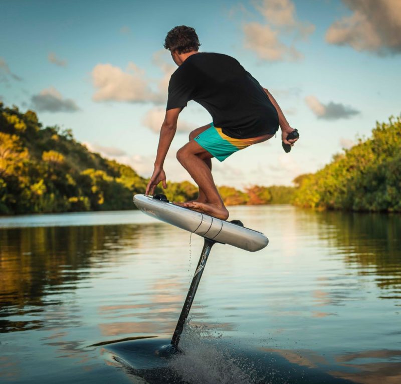 Man riding on e-foil in water