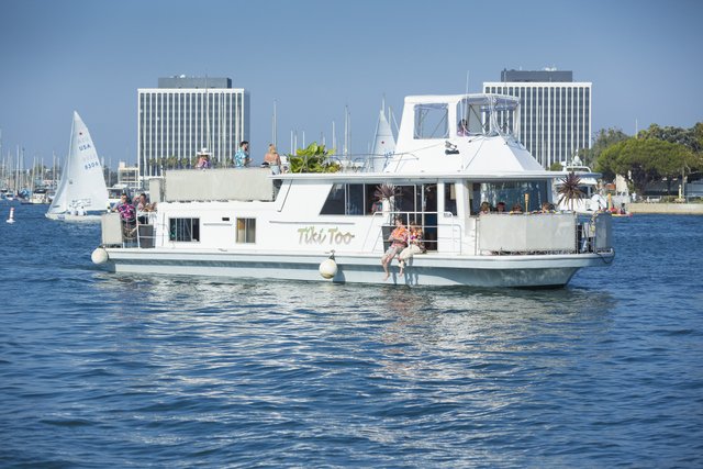 white boat cruising in the ocean