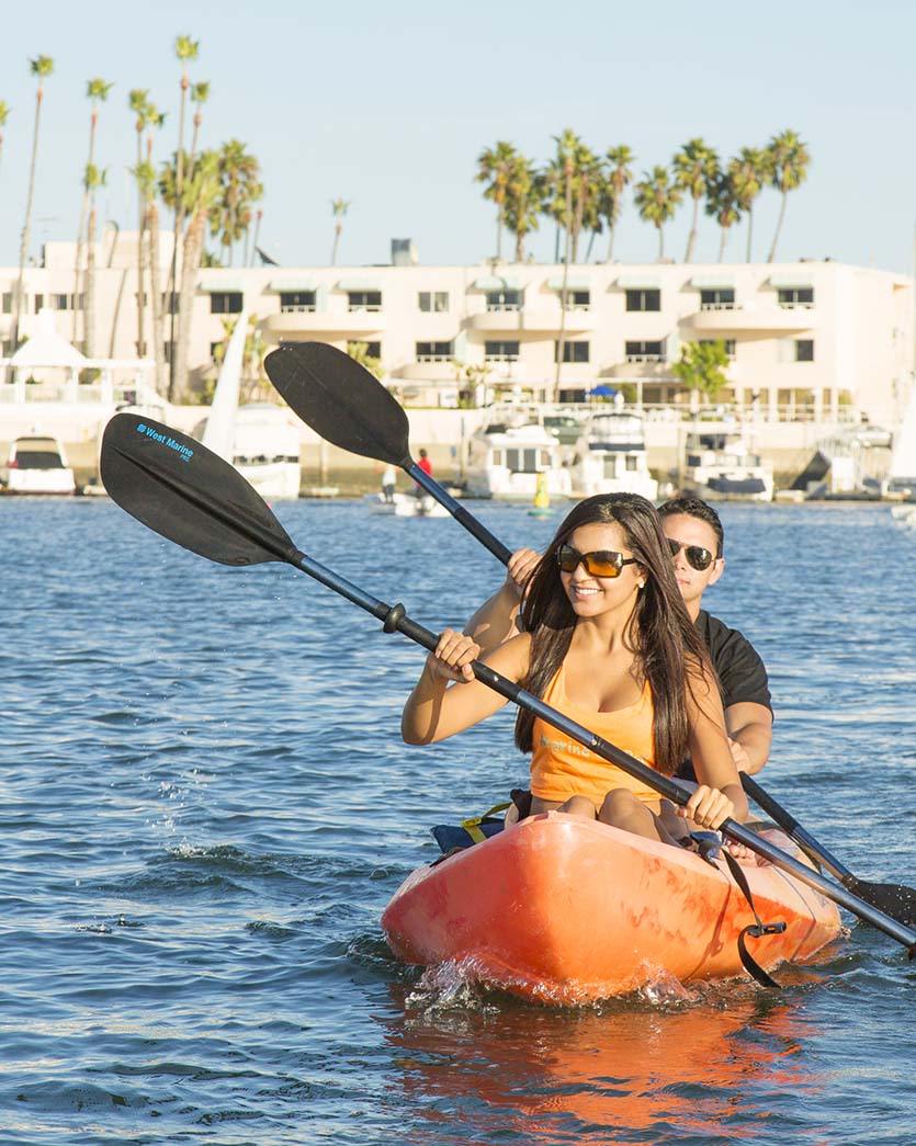 couple enjoying paddle boarding