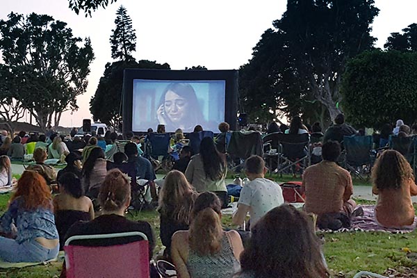 people at marina movie nights outdoors watching movies as annual event in Marina Del Rey