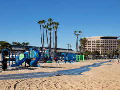 Marina Beach also goes by the local nickname, Mother's Beach, because of the area's family-friendly amenities including covered picnic pavilions, wave-free swimming area, and a children's playground.