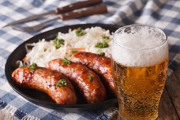 Lager beer and snacks of sausages and sauerkraut