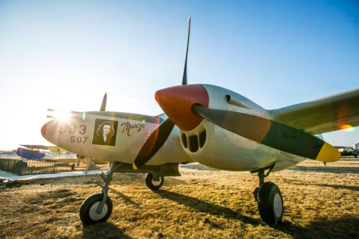 historic airplane in outdoor space at Proud Bird restaurant and museum