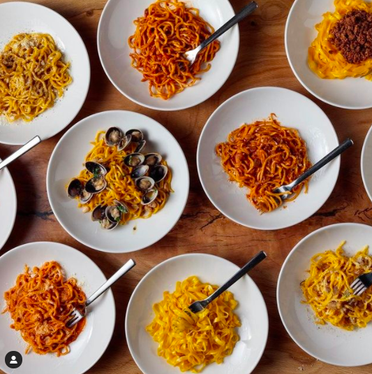 Pasta dishes in bowls on a table